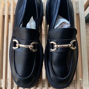 Black Loafers with Gold Buckle